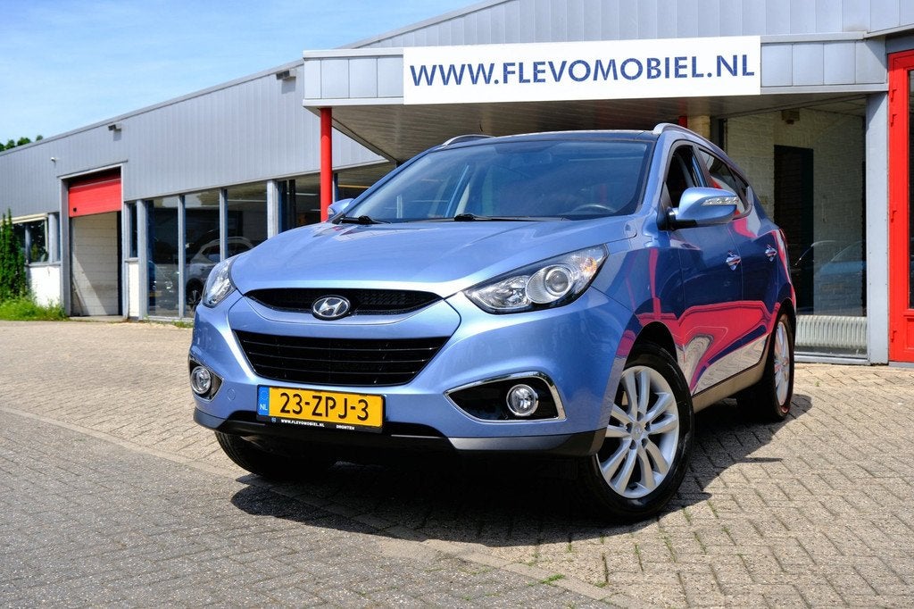 Hyundai Ix35 2.0i 163pk i-Catcher Leder|Pano|Navi|Clima|Cam, Auto's, Hyundai, Gebruikt, 4 cilinders, Stoelverwarming, Blauw
