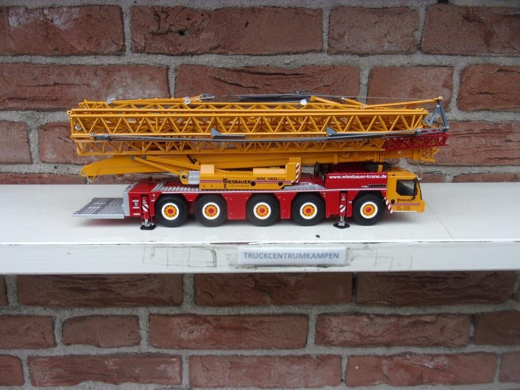 WSI  Liebherr  MK  140  van  Wiesbauer., Hobby en Vrije tijd, Modelauto's | 1:50, Ophalen of Verzenden, Nieuw, Hijskraan, Tractor of Landbouw