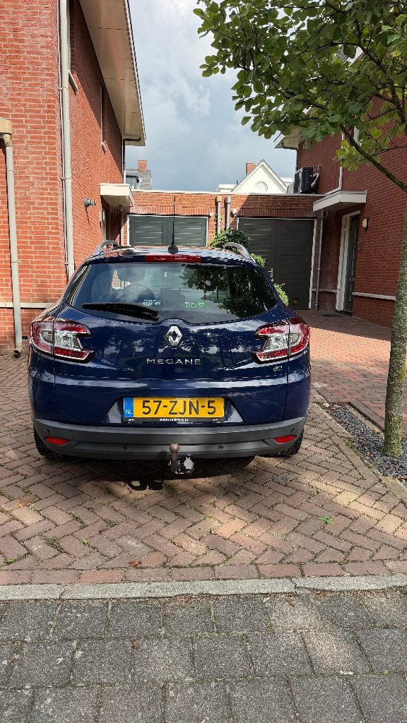 Foto 4 van Renault Mégane 1.5 DCI 81KW Estate 2012 met winterbanden