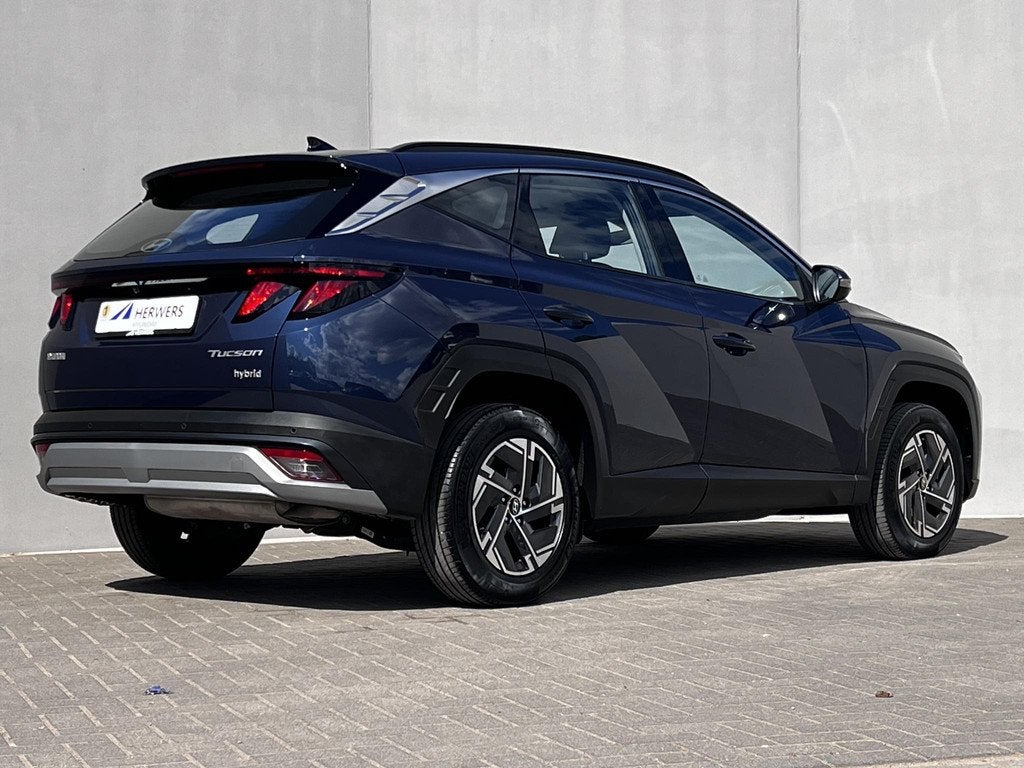 Hyundai Tucson 1.6 T-GDI HEV Comfort / Facelift / Automaat /, Auto's, Hyundai, Stof, Gebruikt, 4 cilinders, 1360 kg