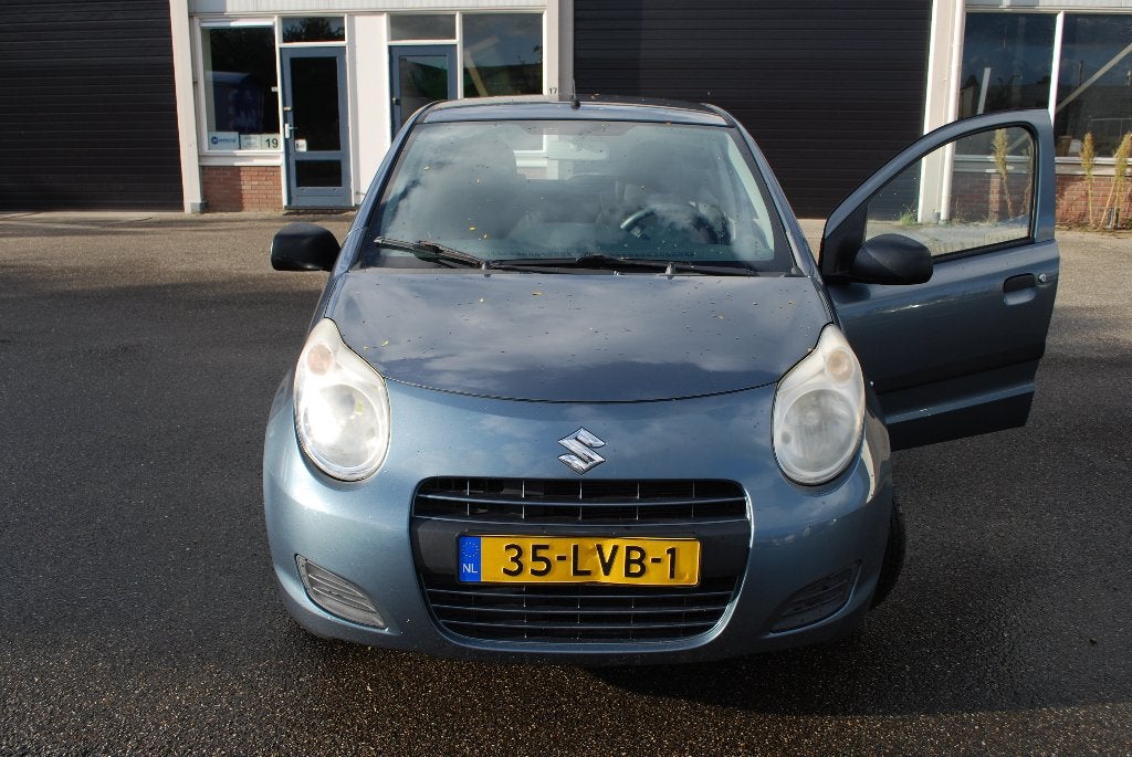 Suzuki Alto 1.0 7-2010 Grijs, Auto's, Voorwielaandrijving, Stof, 4 stoelen, Origineel Nederlands