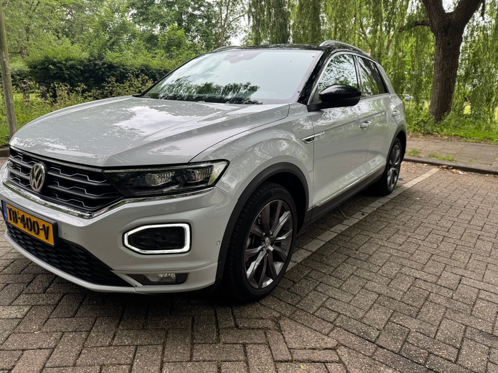 T-Roc 1.5 TSI 150pk 7-DSG  R-line Dak NAP virtual keyless, Auto's, Stof, 1498 cc, 4 cilinders, Wit