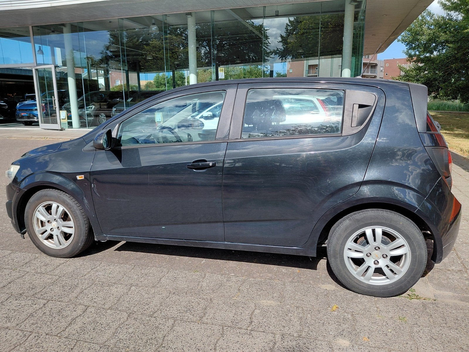 Chevrolet Aveo 1.2 5-DEURS 2013 Zwart, Auto's, Chevrolet, 40 €/maand, Aveo, 4 cilinders, 1039 kg