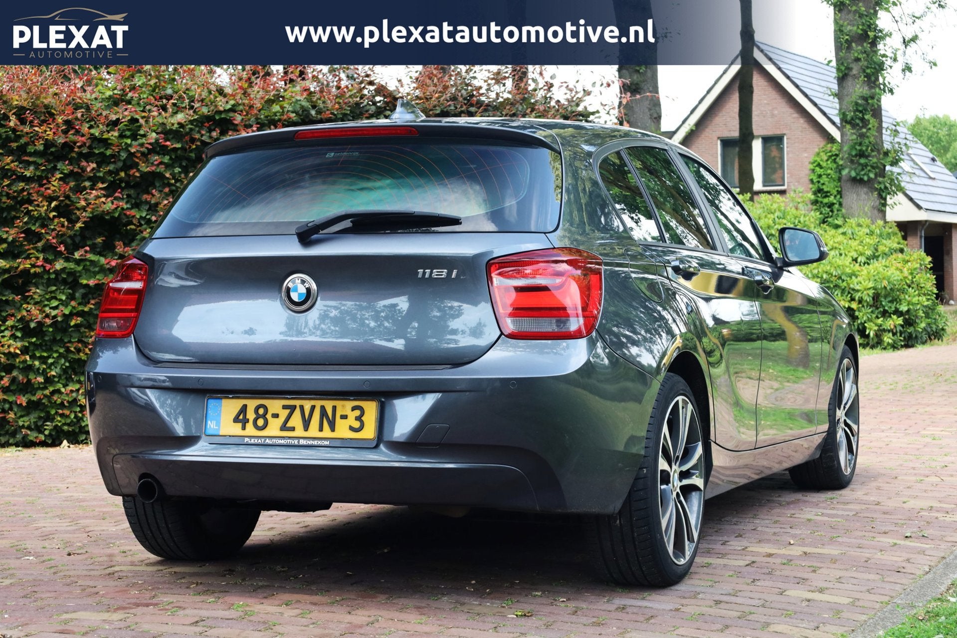 BMW 1-serie 118i Upgrade Edition Aut. | Xenon | Lederen Stoe, Auto's, BMW, Euro 5, Achterwielaandrijving, Gebruikt, Zwart