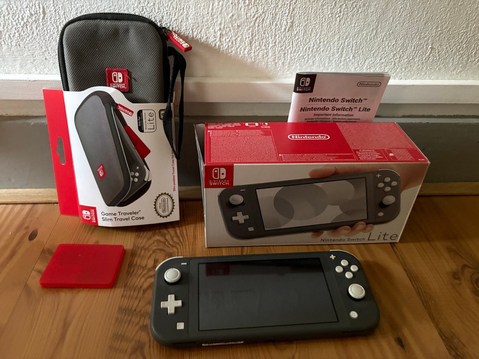 Nintendo Switch Lite Grijs met hoesje en doos, Ophalen of Verzenden, Grijs, Zo goed als nieuw, Met beschermhoes of tas