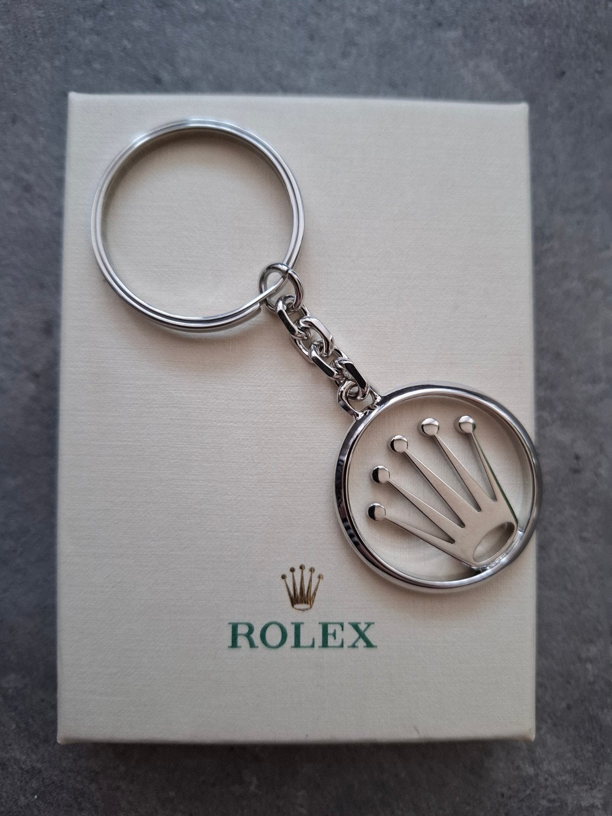 Rolex Crown Logo Sleutelhanger Nieuw., Ophalen of Verzenden, Nieuw, Staal, Rolex