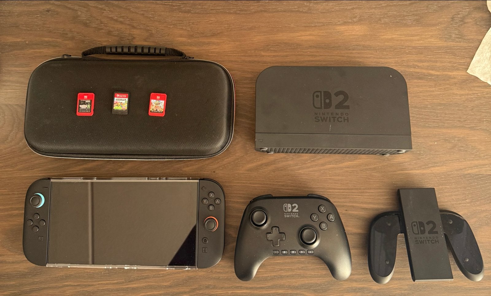 Nintendo Switch OLED met accessoires en 3 games