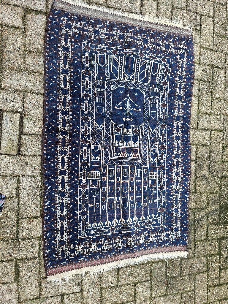 Blauw vloerkleed met uniek patroon, Gebruikt, Blauw, 200 cm of meer, Ophalen of Verzenden