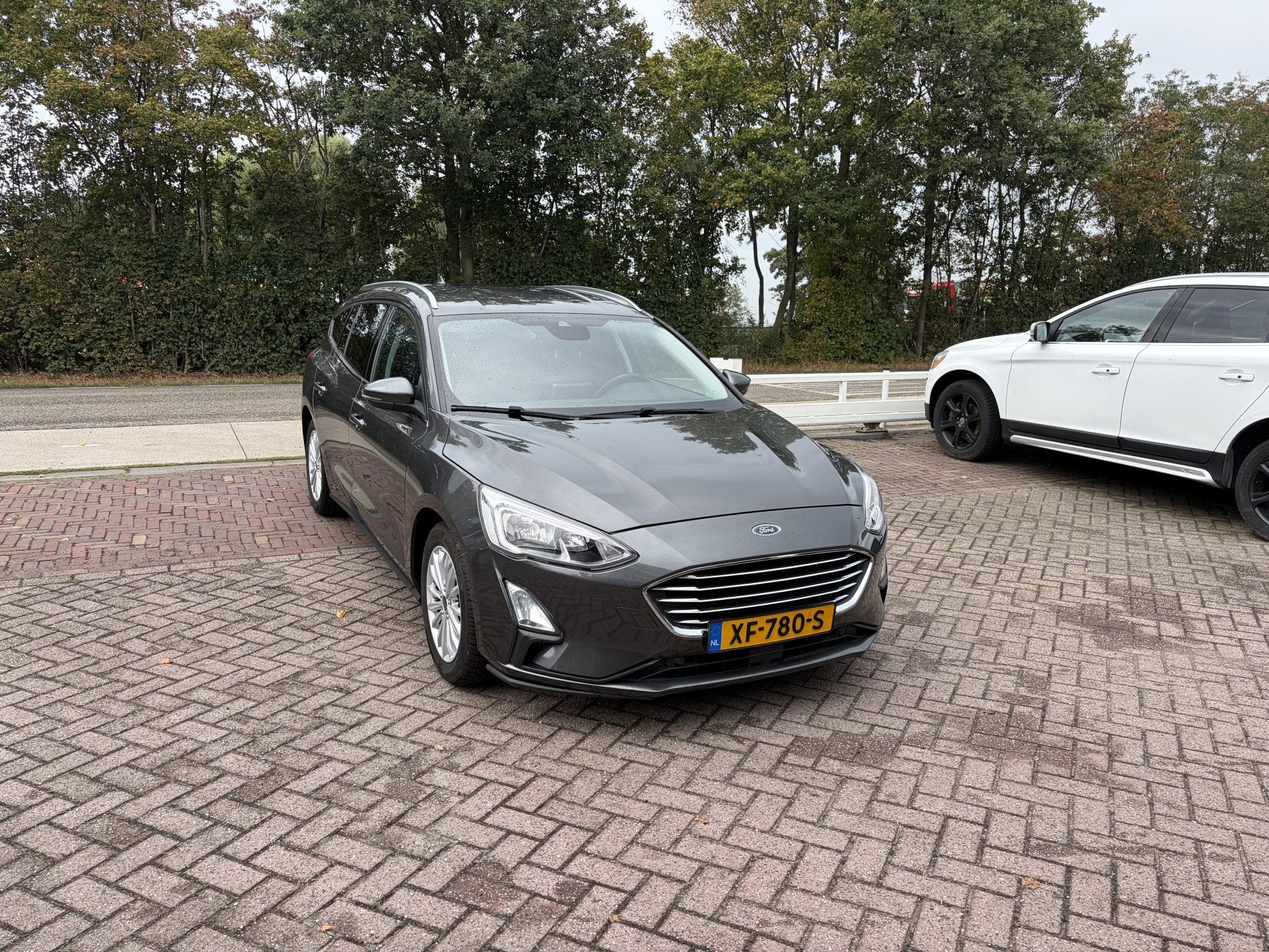 Ford FOCUS Wagon 1.0 EcoBoost Titanium Business TREKHAAK WIN, Stof, Gebruikt, 1283 kg, Origineel Nederlands