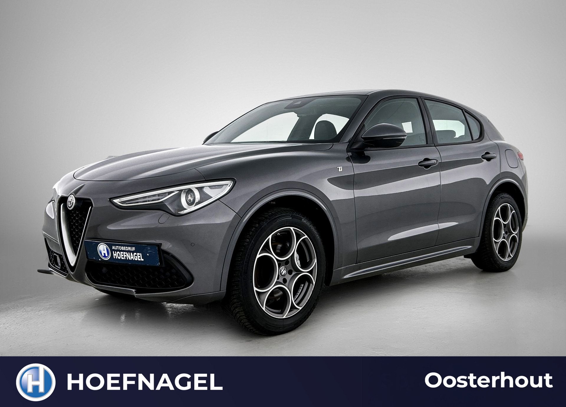 Alfa Romeo Stelvio 2.0 T AWD Ti Q4 | Automaat | Adaptive Cru, Auto's, Alfa Romeo, Zwart, 4 cilinders, 1655 kg, Leder