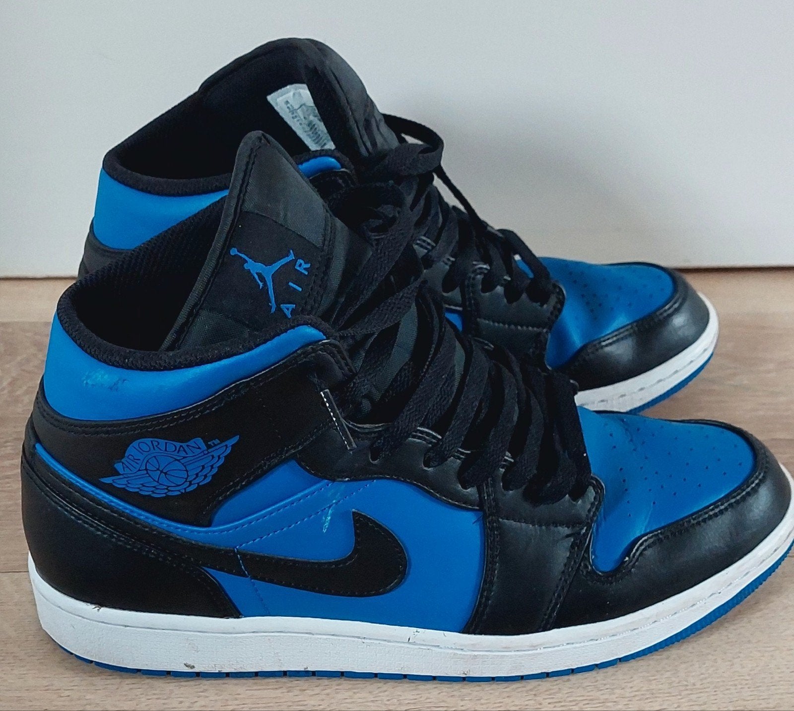 Nike air Jordan 1 Mid koningsblauw/zwarte sneakers maat 43., Blauw, Ophalen of Verzenden, Zo goed als nieuw, Nike Air Jordan