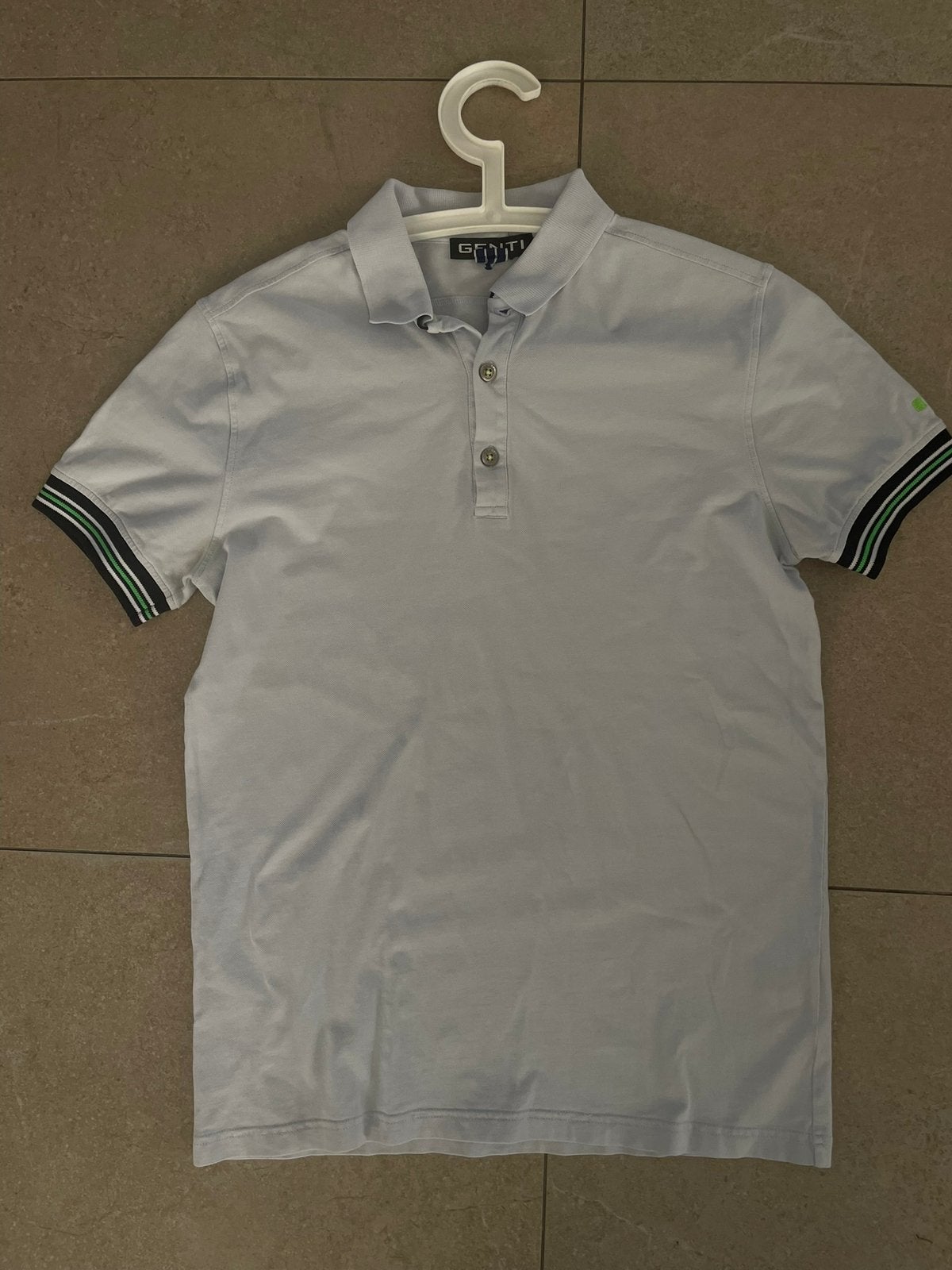 Lichtblauwe Genti polo maat S, Blauw, Ophalen of Verzenden, Gedragen, Maat 46 (S) of kleiner