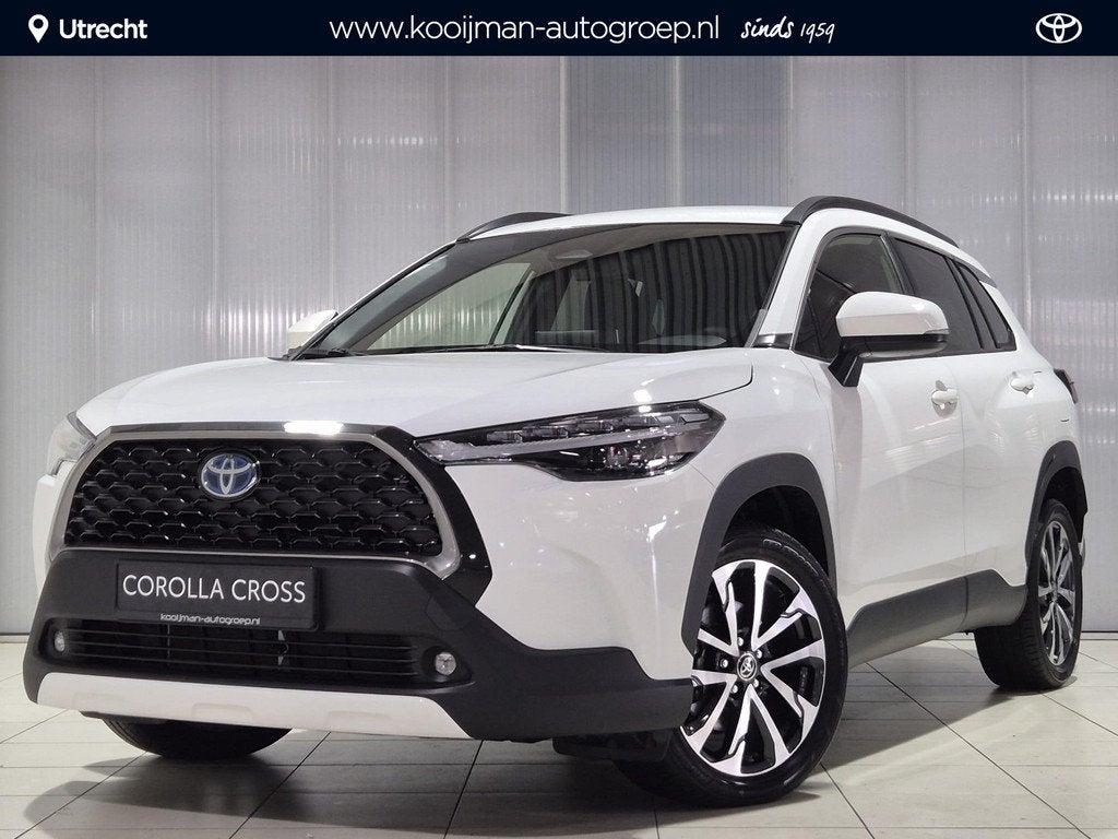 Toyota Corolla Cross Hybrid 200 Dynamic Adaptieve cruise con, Auto's, Automatische klimaatregeling, Gebruikt, 4 cilinders, Bedrijf