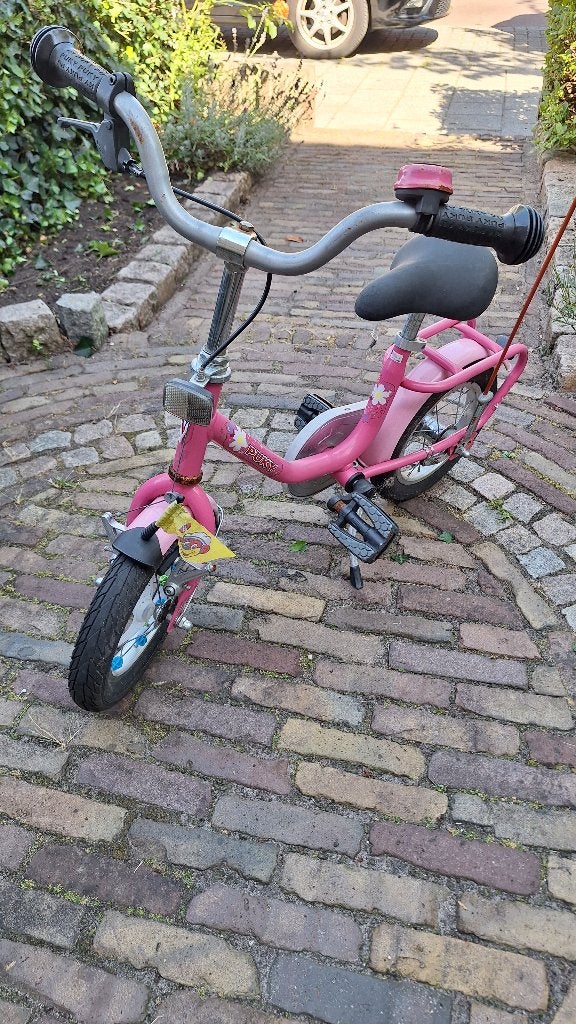 Roze kinderfiets met zijwieltjes en vlag, Ophalen, Terugtraprem, Zijwieltjes, Gebruikt