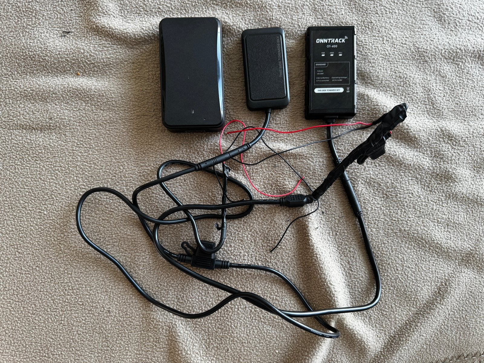 3 GPS trackers Onntrack., Ophalen