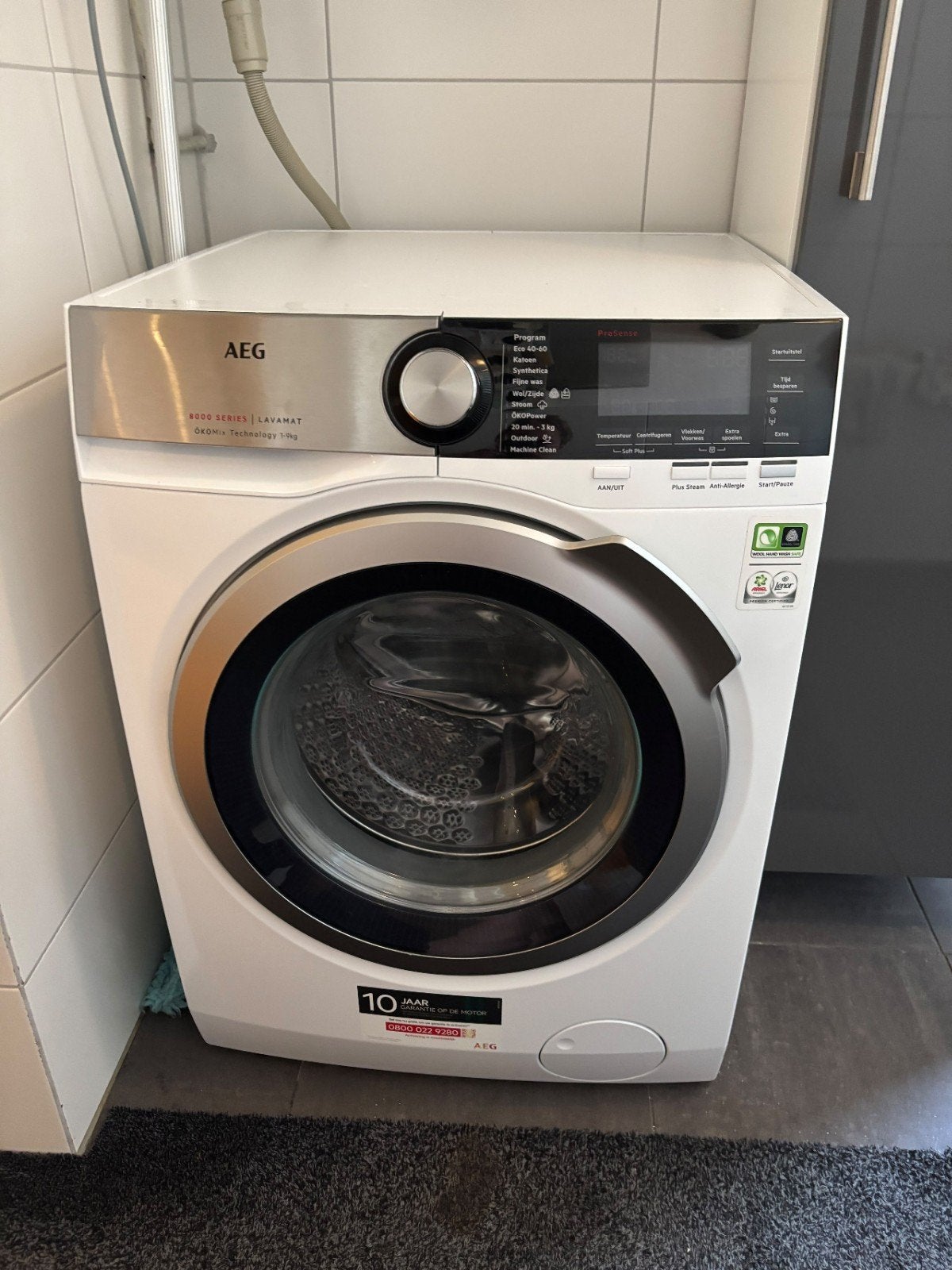AEG L8FEN96CS Wasmachine 9kg, Ophalen, 1200 tot 1600 toeren, 8 tot 10 kg, Zo goed als nieuw