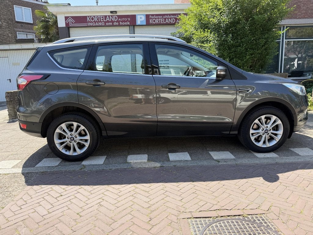 Ford Kuga 1.5 EcoBoost Titanium 4WD PANO NAVI CAMERA LEER, Auto's, Ford, Automaat, 4 cilinders, 1586 kg, Bedrijf