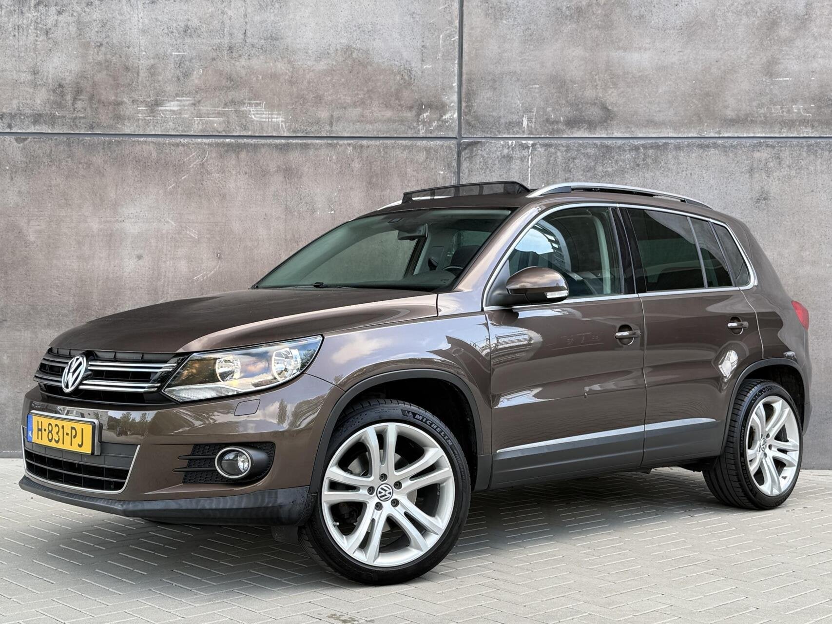 Volkswagen Tiguan 1.4 TSI Sport&Style | Trekhaak | Panoramad, Auto's, Voorwielaandrijving, Euro 5, Zwart, 4 cilinders