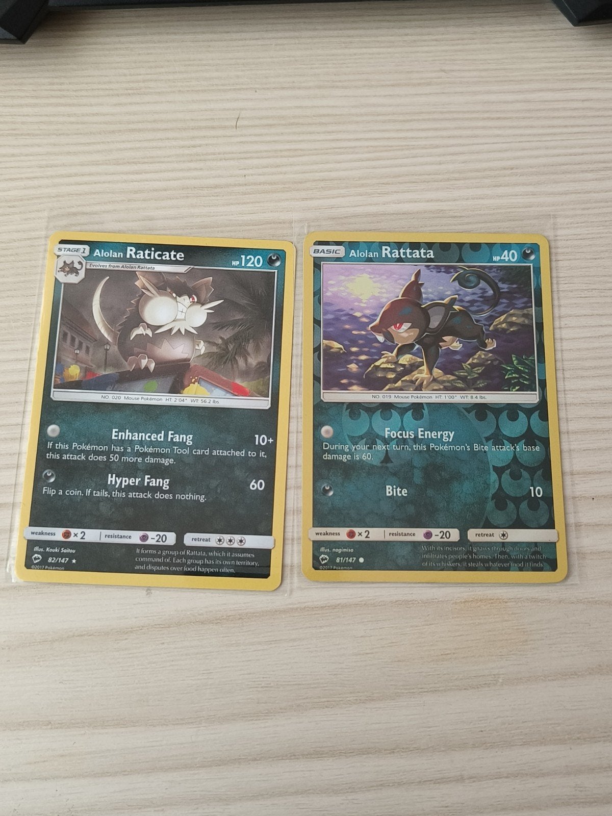Alolan rattata reverse holo & alolan raticate burning 81/82, Ophalen of Verzenden, Zo goed als nieuw, Meerdere kaarten, Foil