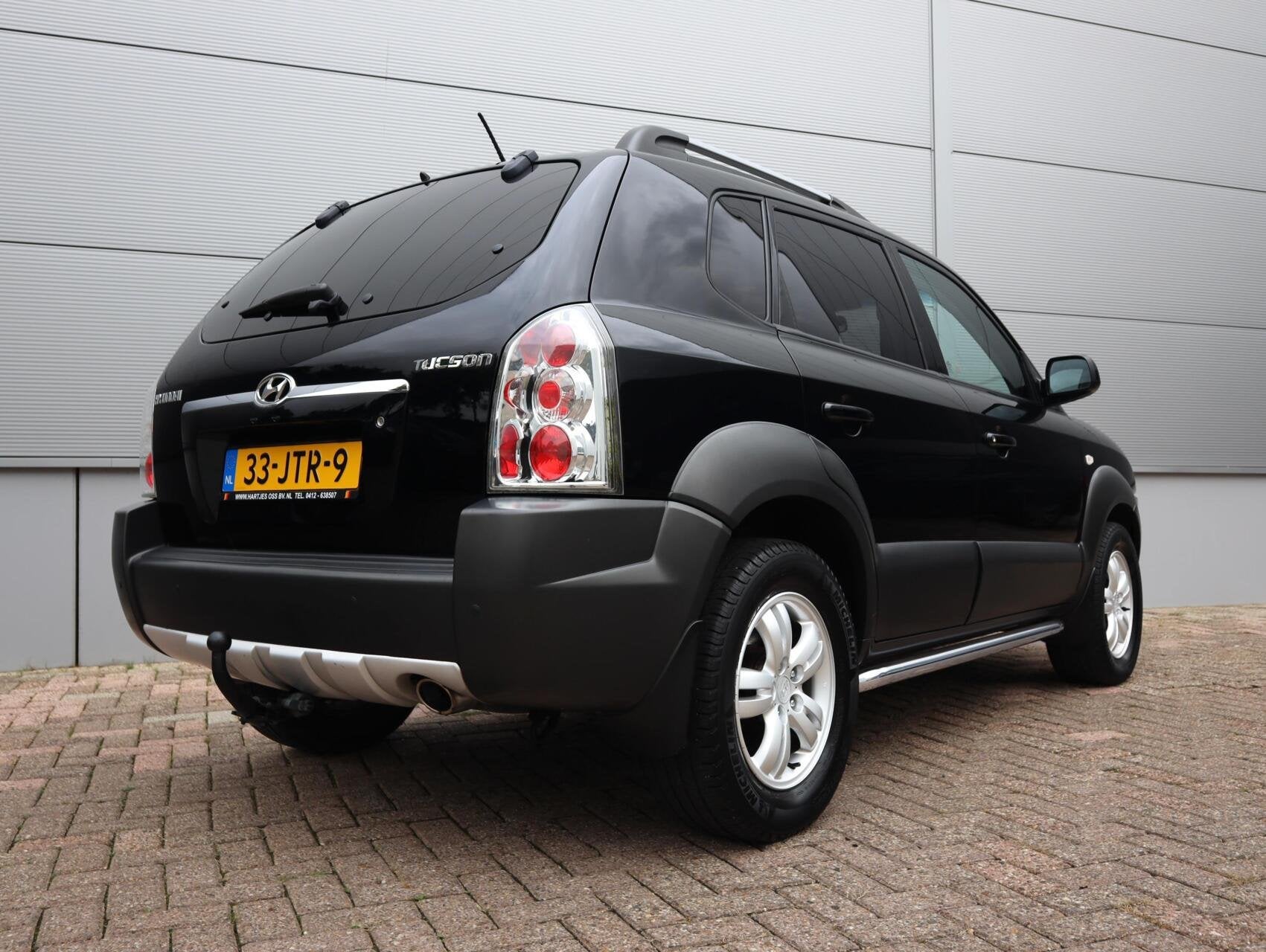 Hyundai Tucson 2.0i Style Cross (Vol-Opties!) NL-auto, Gebruikt, Huisgarantie, 4 cilinders, Zwart