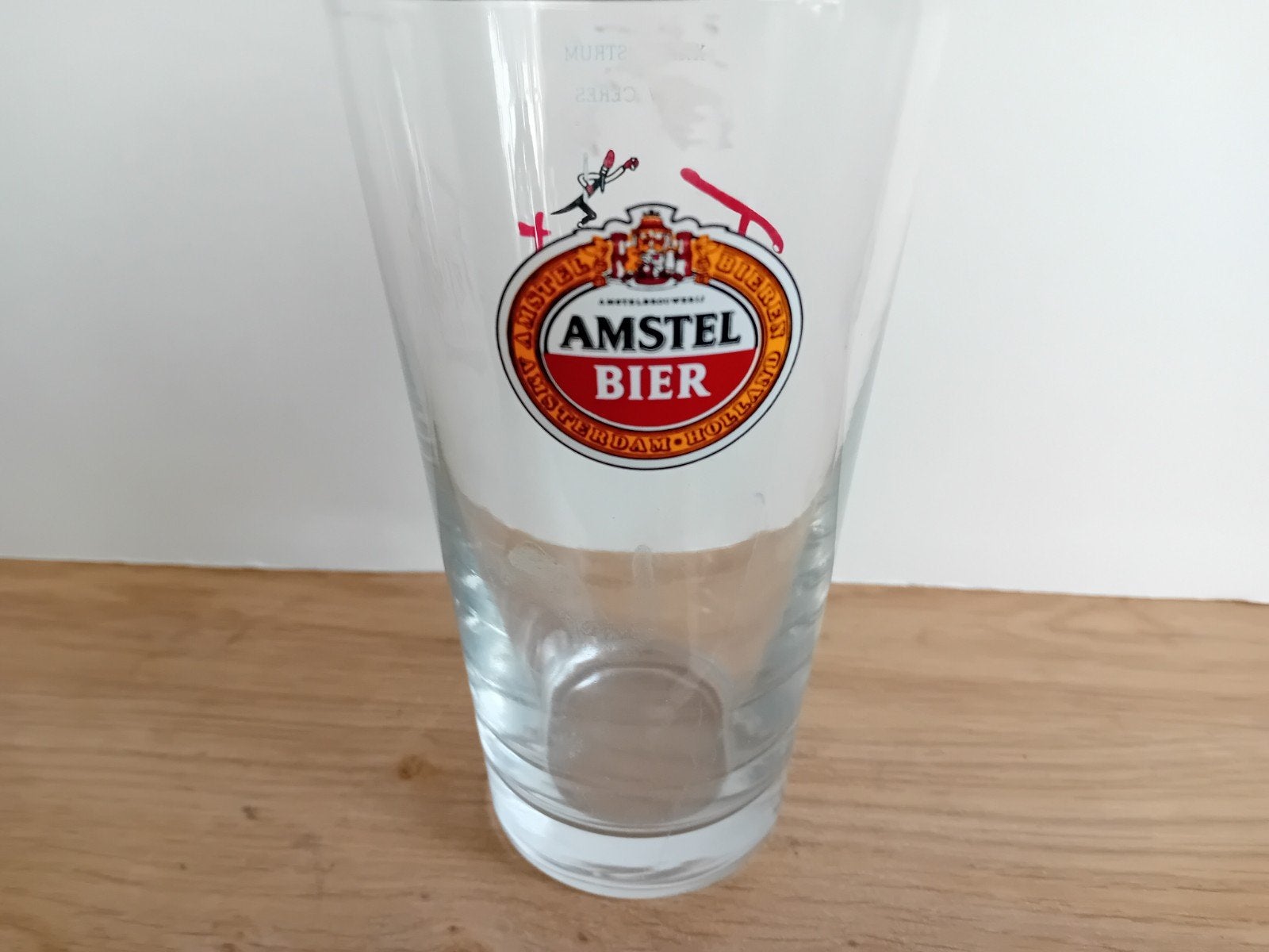 Amstel glas nummer 1 met achteropdruk, Verzamelen, Ophalen of Verzenden, Zo goed als nieuw, Glas of Glazen, Amstel