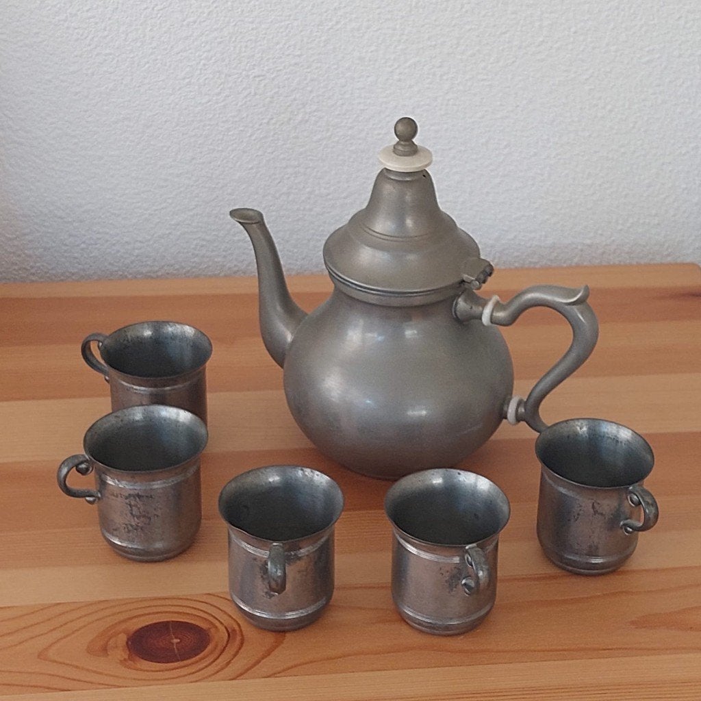 tin moccasetje uit Tiel, Ophalen