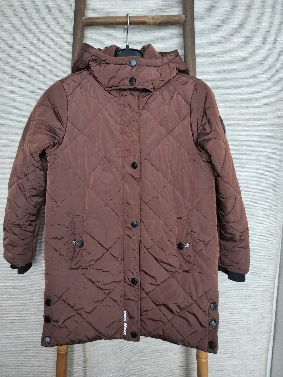 WE winterjas maat 134-140, Kinderen en Baby's, Kinderkleding | Maat 134, Ophalen of Verzenden, Zo goed als nieuw