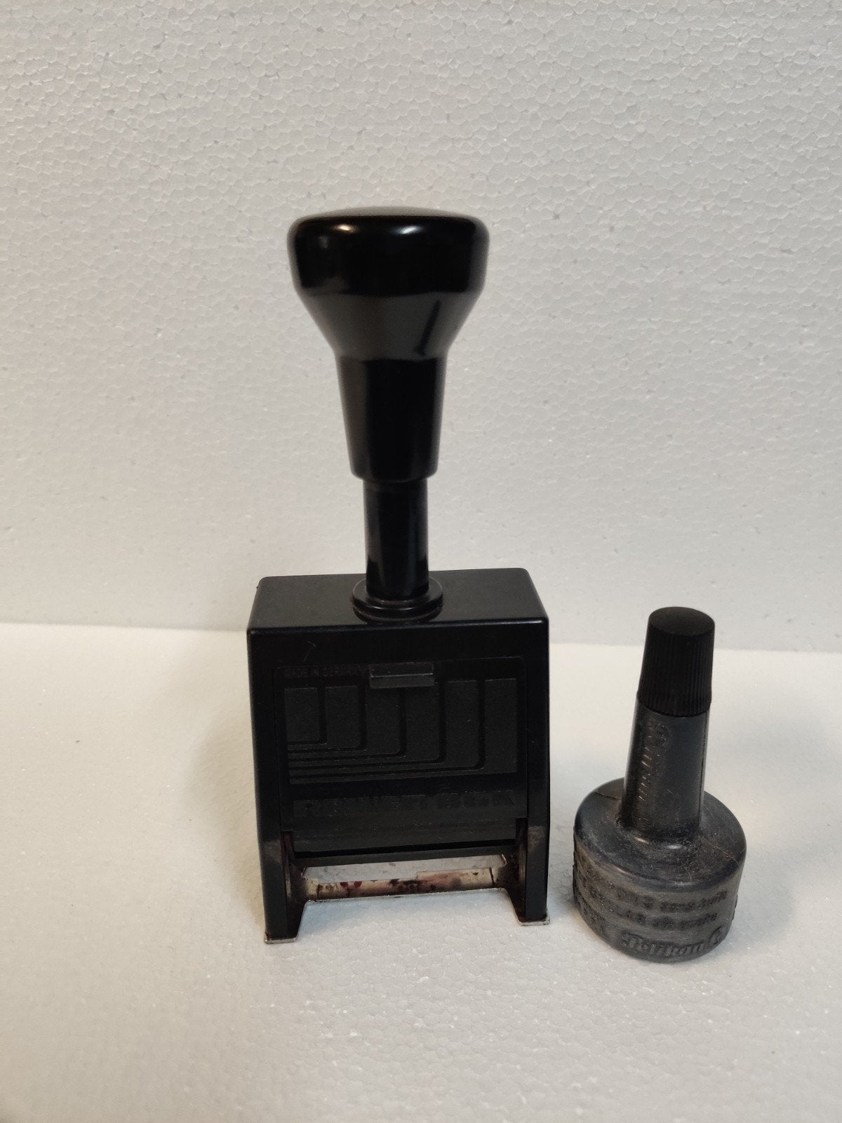 Reiner B6K nummerstempel / numeroteur met een flesje inkt, Ophalen of Verzenden