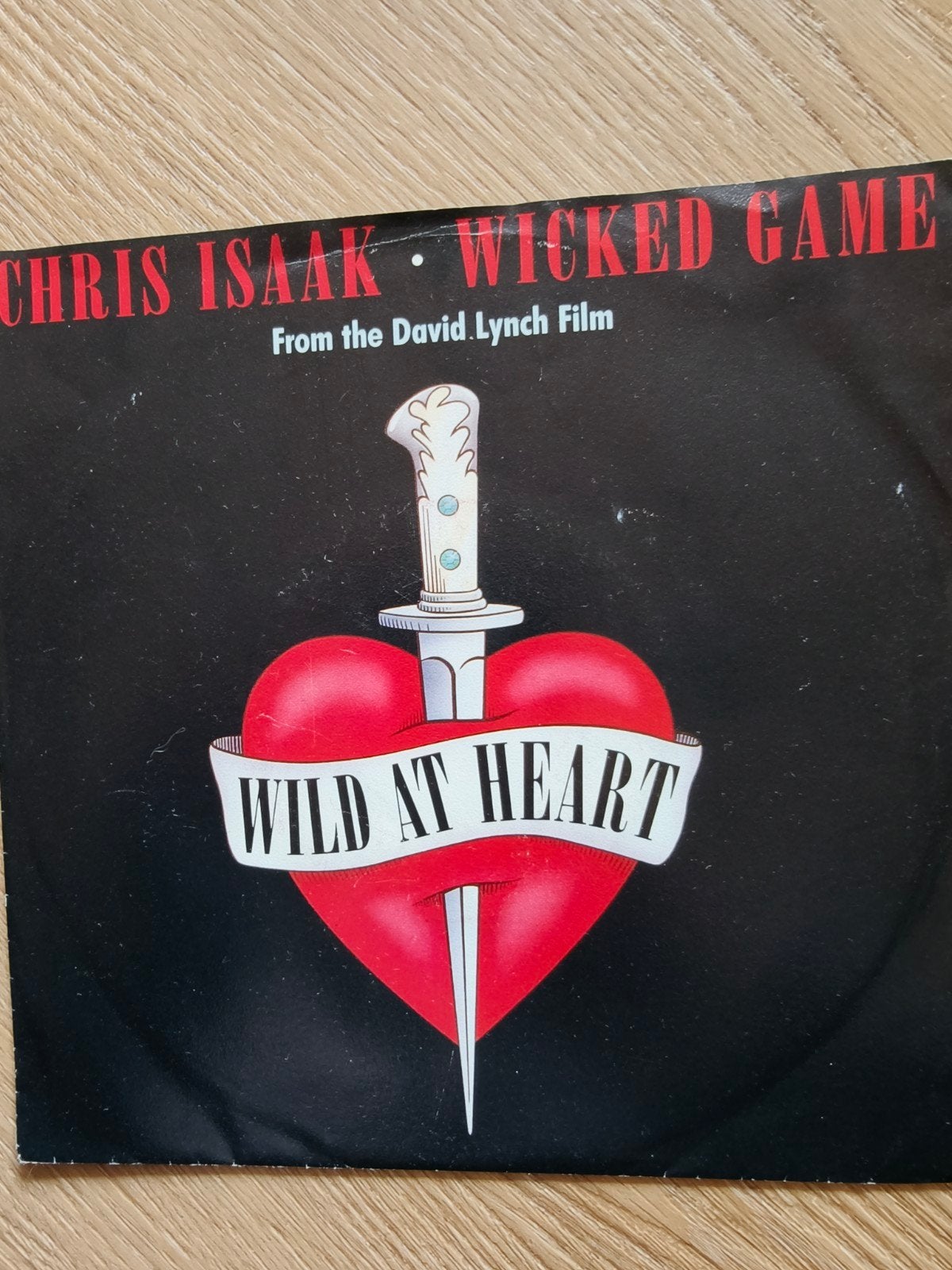 Chris Isaak - Wicked Game (Wild at Heart) 7 inch vinyl singl, Gebruikt, 7 inch, Ophalen of Verzenden, Pop