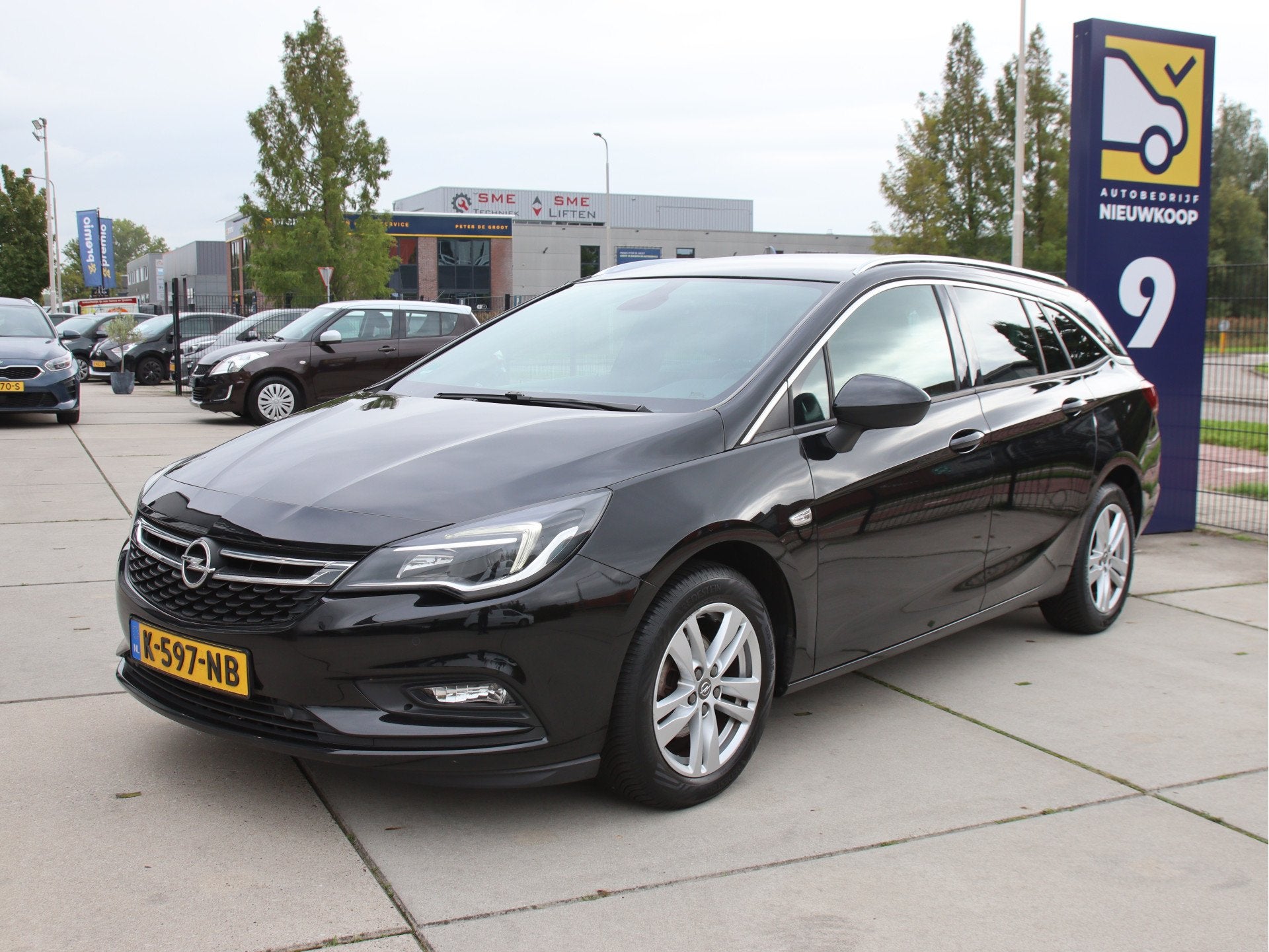 Opel Astra Sports Tourer 1.4 Business Executive Stuur-Stoel, Gebruikt, 150 pk, Zwart, 1240 kg