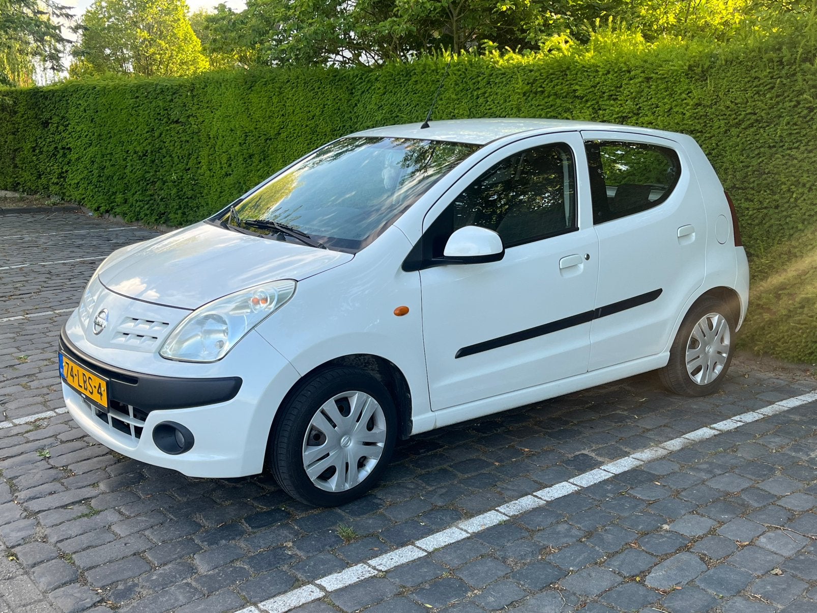 Nissan Pixo 1.0 50KW 5D 2010 Wit, Auto's, Voorwielaandrijving, Stof, Elektrische ramen, 4 stoelen