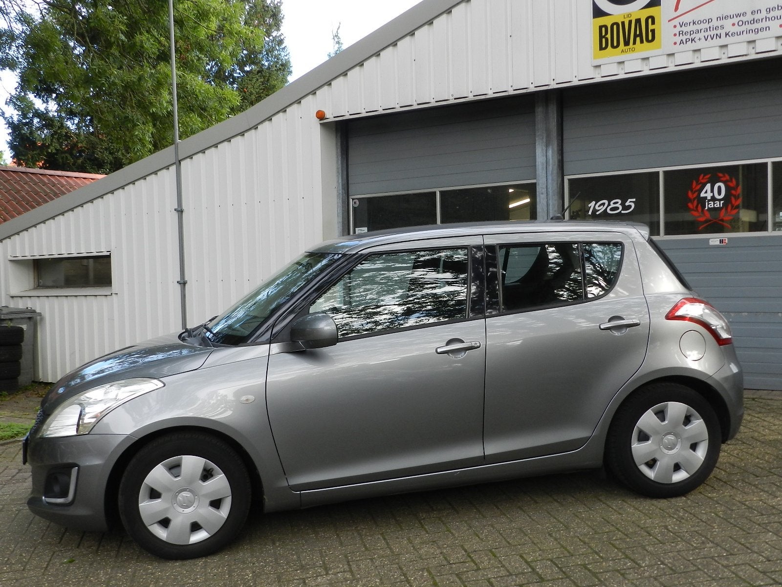 Suzuki Swift 1.2 5Drs Comfort EASSS Airco Isofix Metallic la, Auto's, Stof, Gebruikt, 4 cilinders, 400 kg