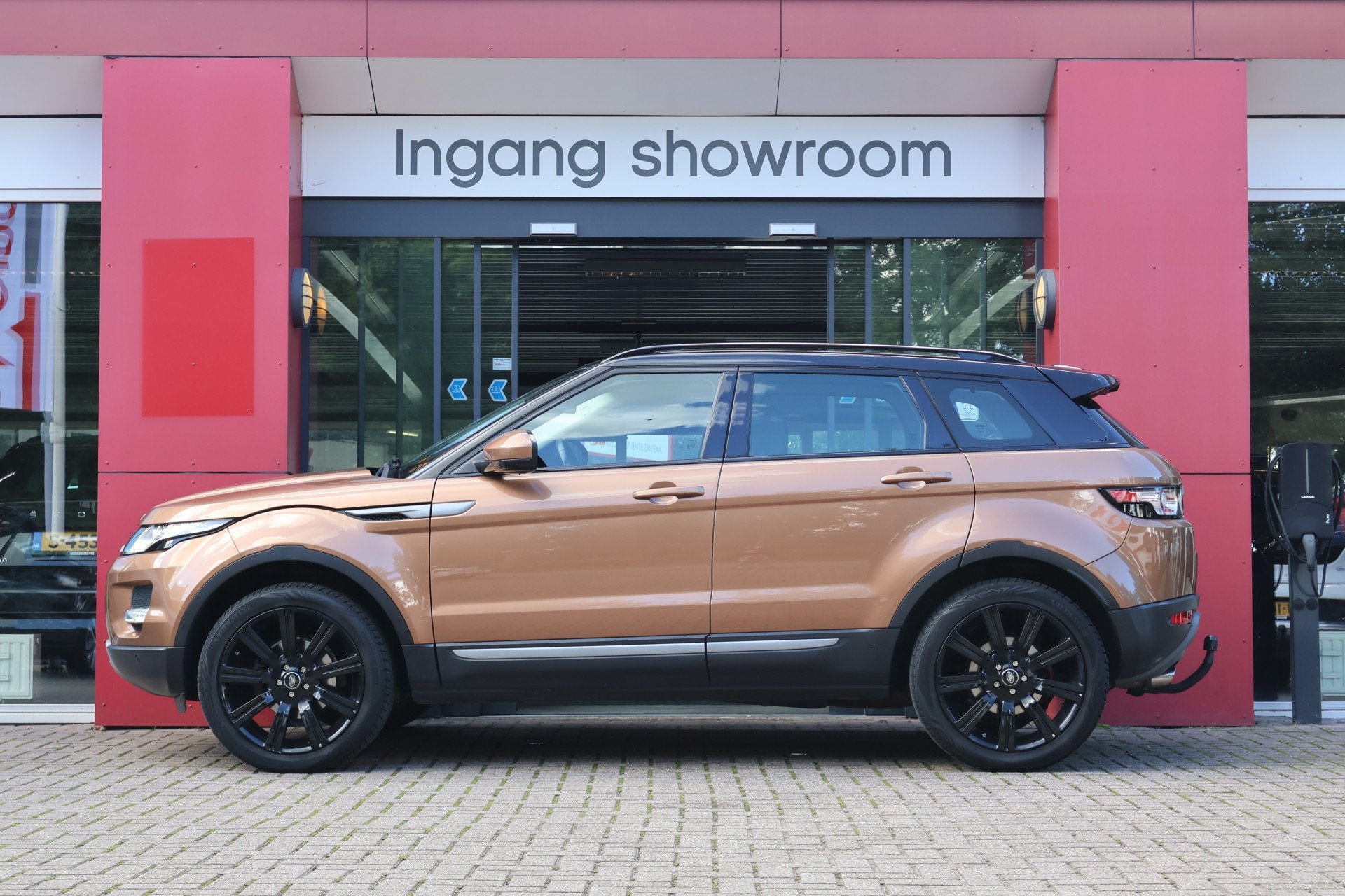 Land Rover Range Rover Evoque 2.0 Si 4WD Sicilian Yellow | S, Auto's, Automaat, Euro 5, Zwart, 4 cilinders
