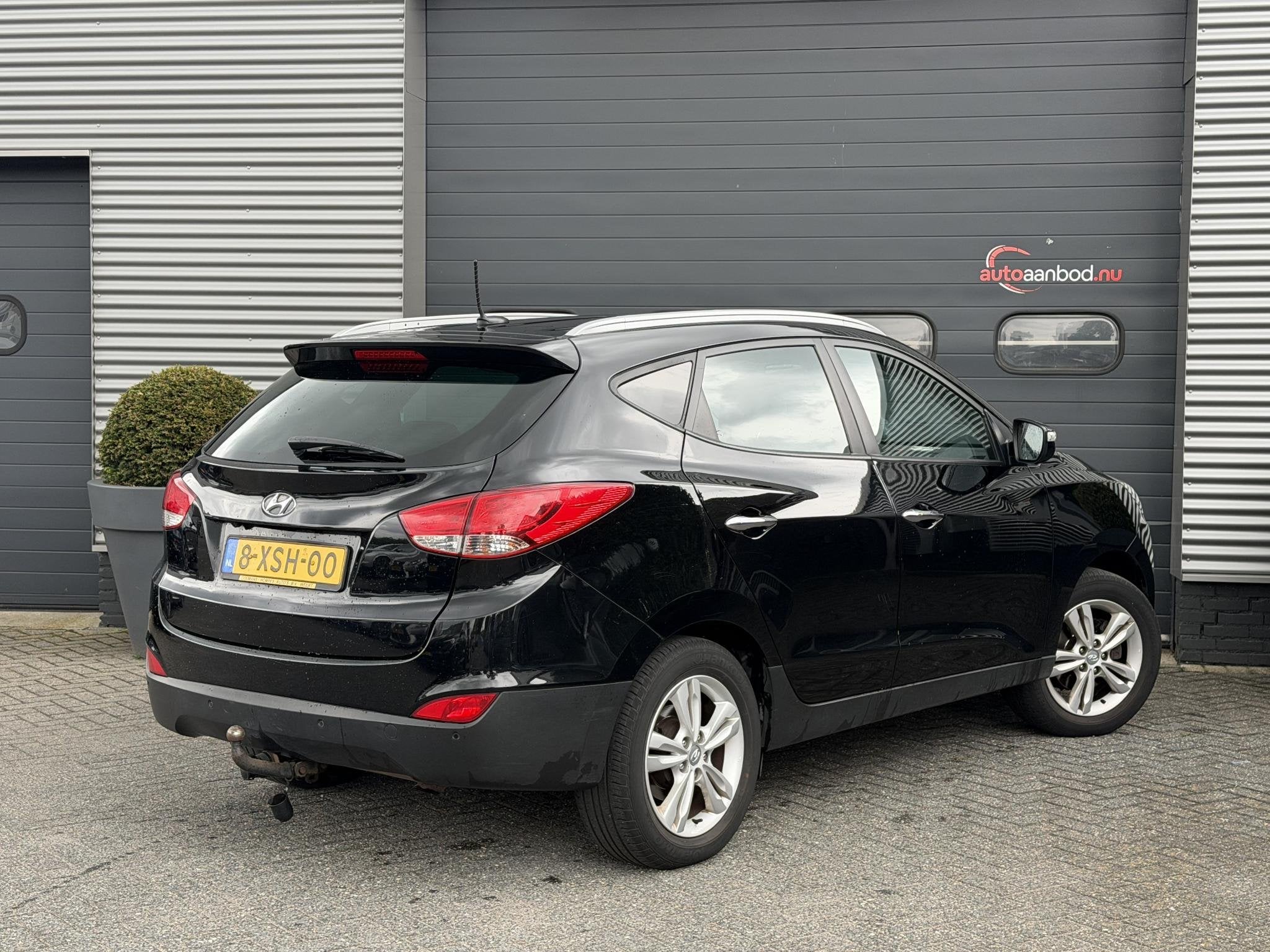 Hyundai ix35 2.0i 4WD i-Catcher | Camera | Navigatie | Clima, Auto's, Automaat, 1502 kg, Gebruikt, Leder