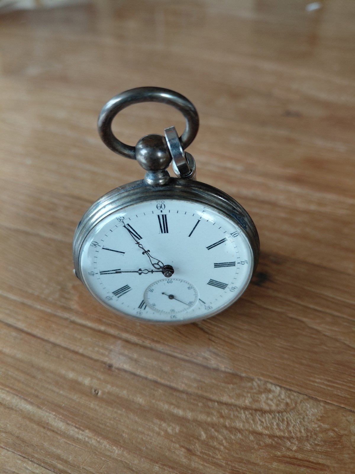 Antiek zakhorloge met ketting en sleutels, Ophalen
