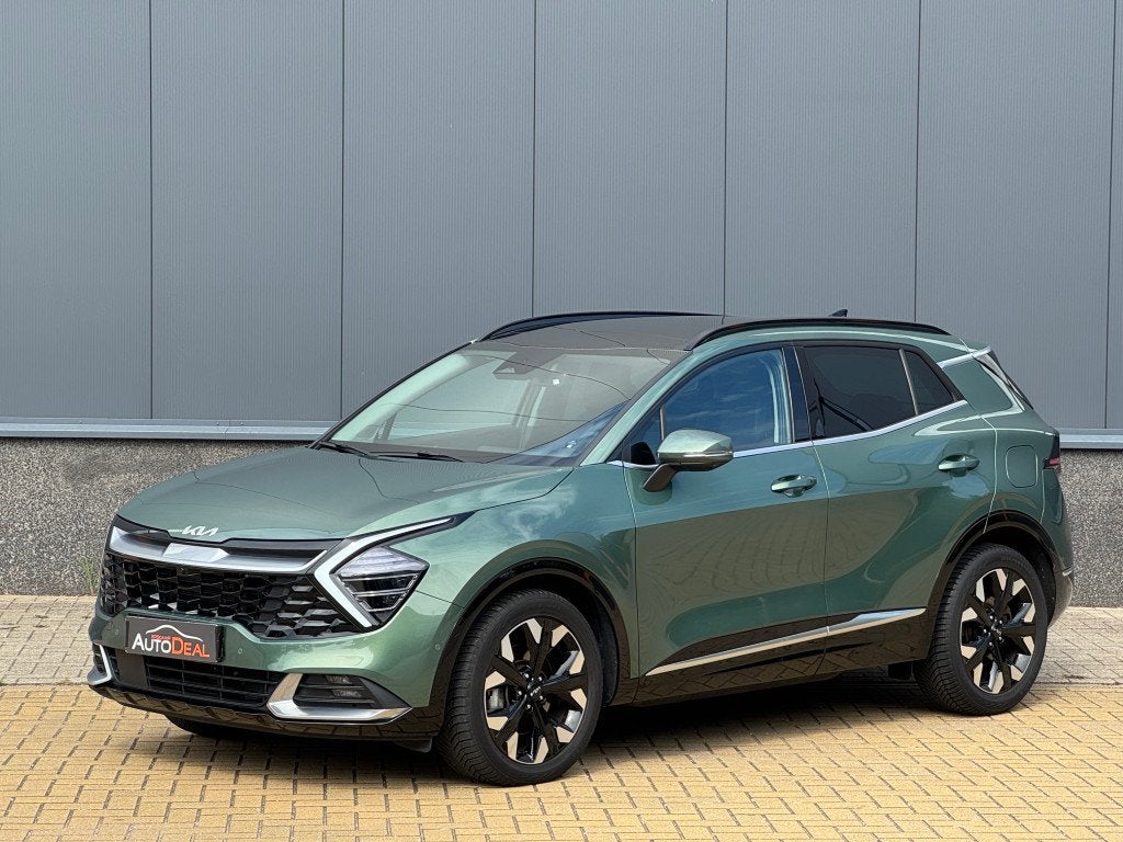 Kia Sportage 1.6 T-GDi AWD Hybrid PHEV DynamicPlusLine Leer,, Auto's, 12 maanden, Gebruikt, Zwart, 4 cilinders
