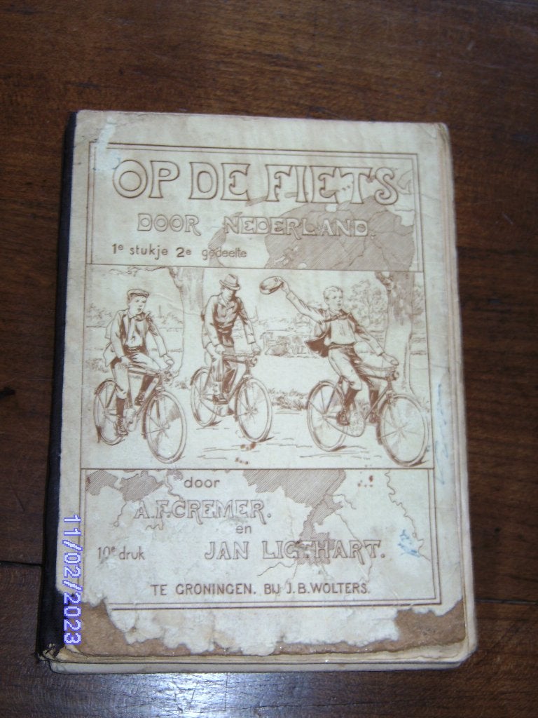 Op de fiets door Nederland 1e st  dl 2e1915 aardrijks leesbk, Ophalen of Verzenden, Gebruikt