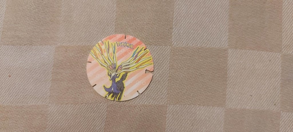 flippo pokemon chiki balls zeldzaam Xerneas, Ophalen of Verzenden, Losse flippo's