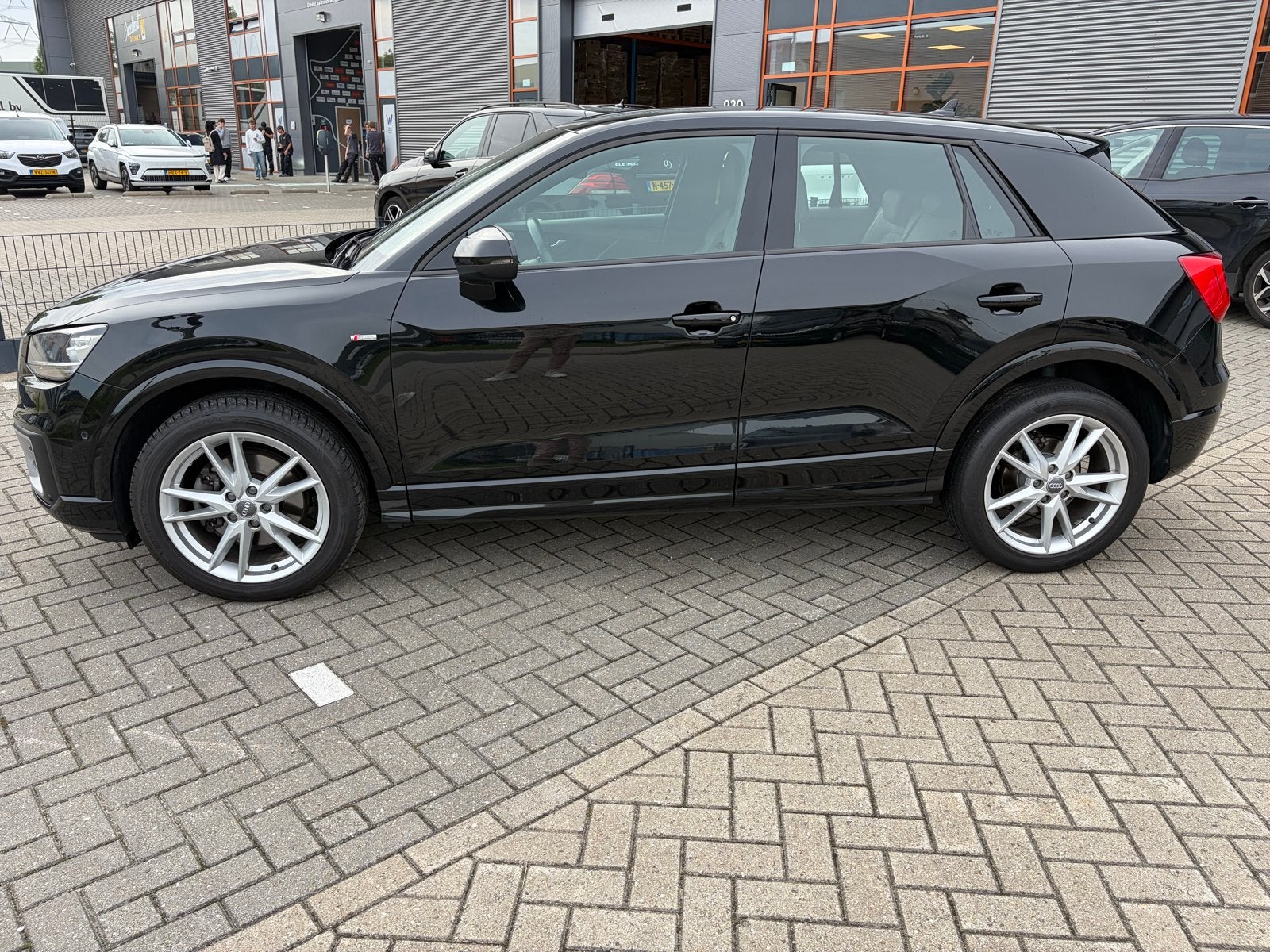 Audi Q2 1.4 Tfsi CoD 150pk S Tronic 2018 Sport S-Line zwart, 4 cilinders, Zwart, Leder, 1395 cc