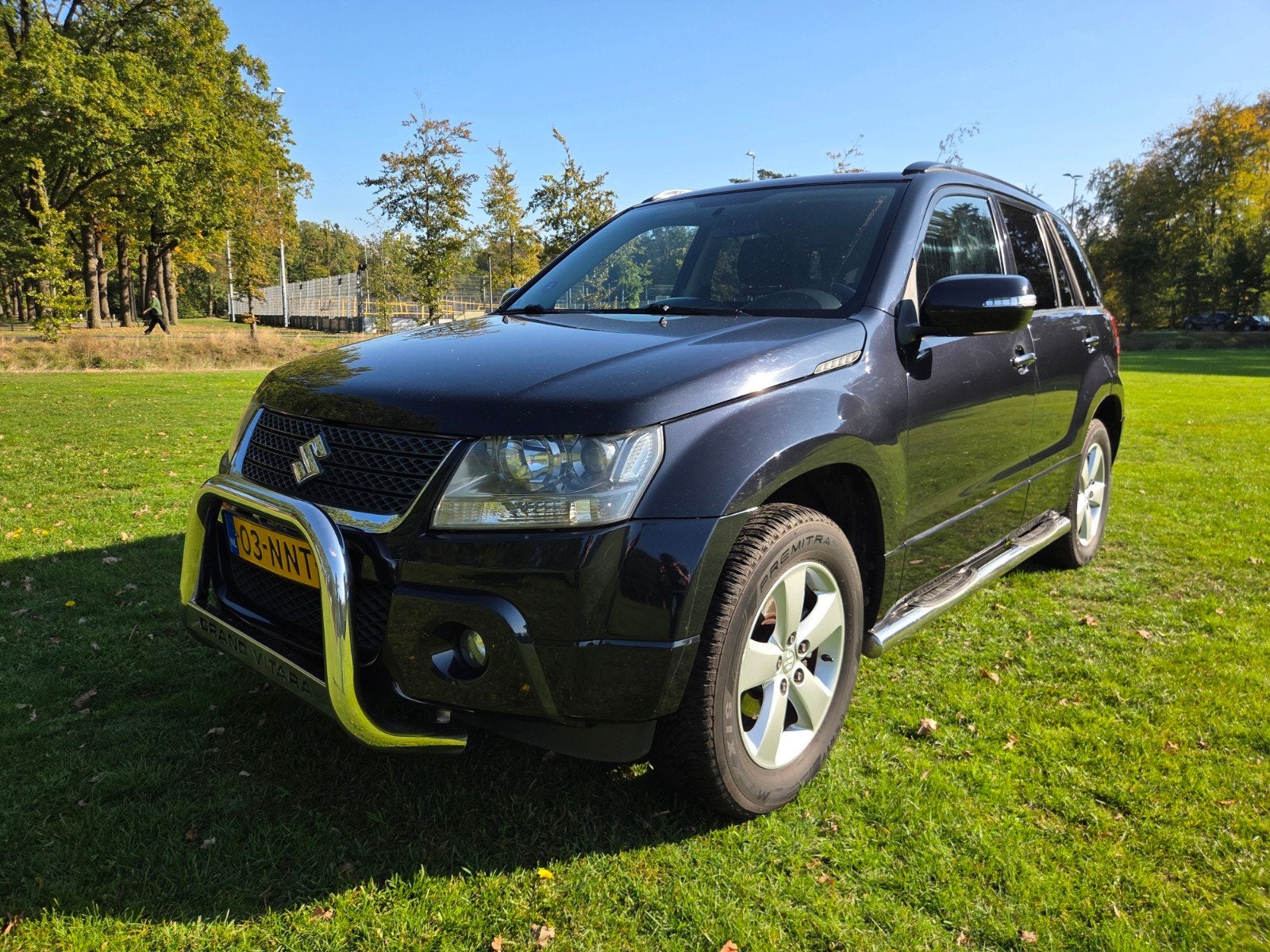 Suzuki Grand Vitara 2.4 5D 2010 Zwart, Auto's, Stof, Zwart, 4 cilinders, 1850 kg