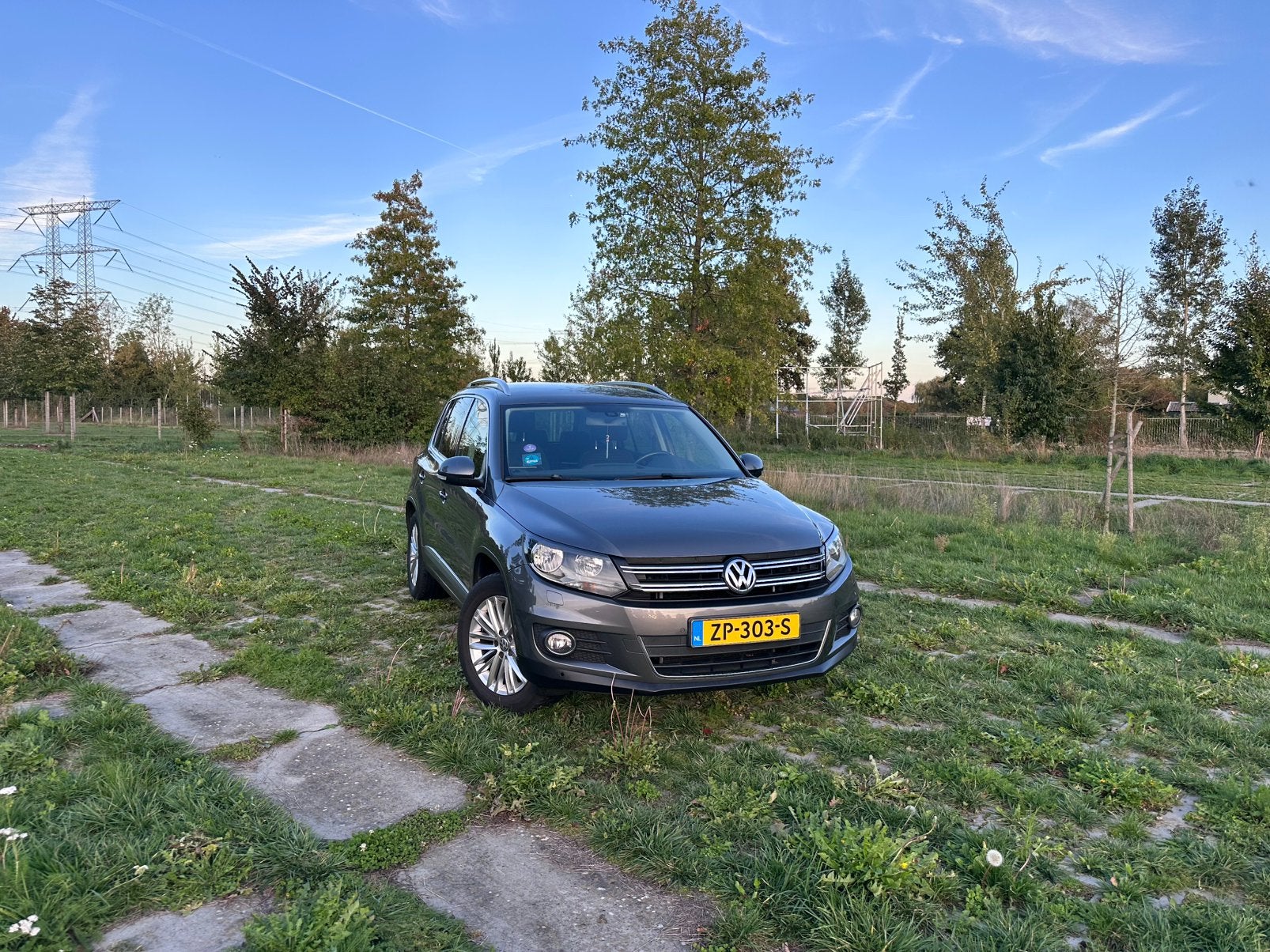 Volkswagen Tiguan 1.4 TSI CUP - 2014 Grijs - Automaat, Auto's, Parkeerassistent, Stof, 1800 kg, 4 cilinders