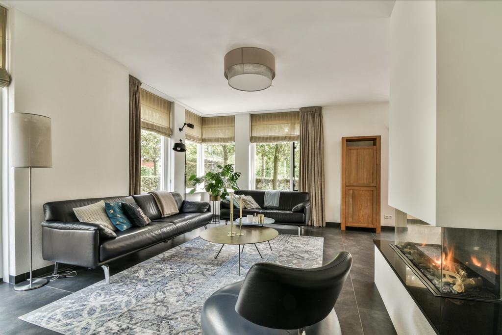 Leolux Bora Balanza 3,5- en 2,5-zitsbanken Zwart Leer, Huis en Inrichting, Banken | Bankstellen, Gebruikt, 300 cm of meer, Ophalen of Verzenden