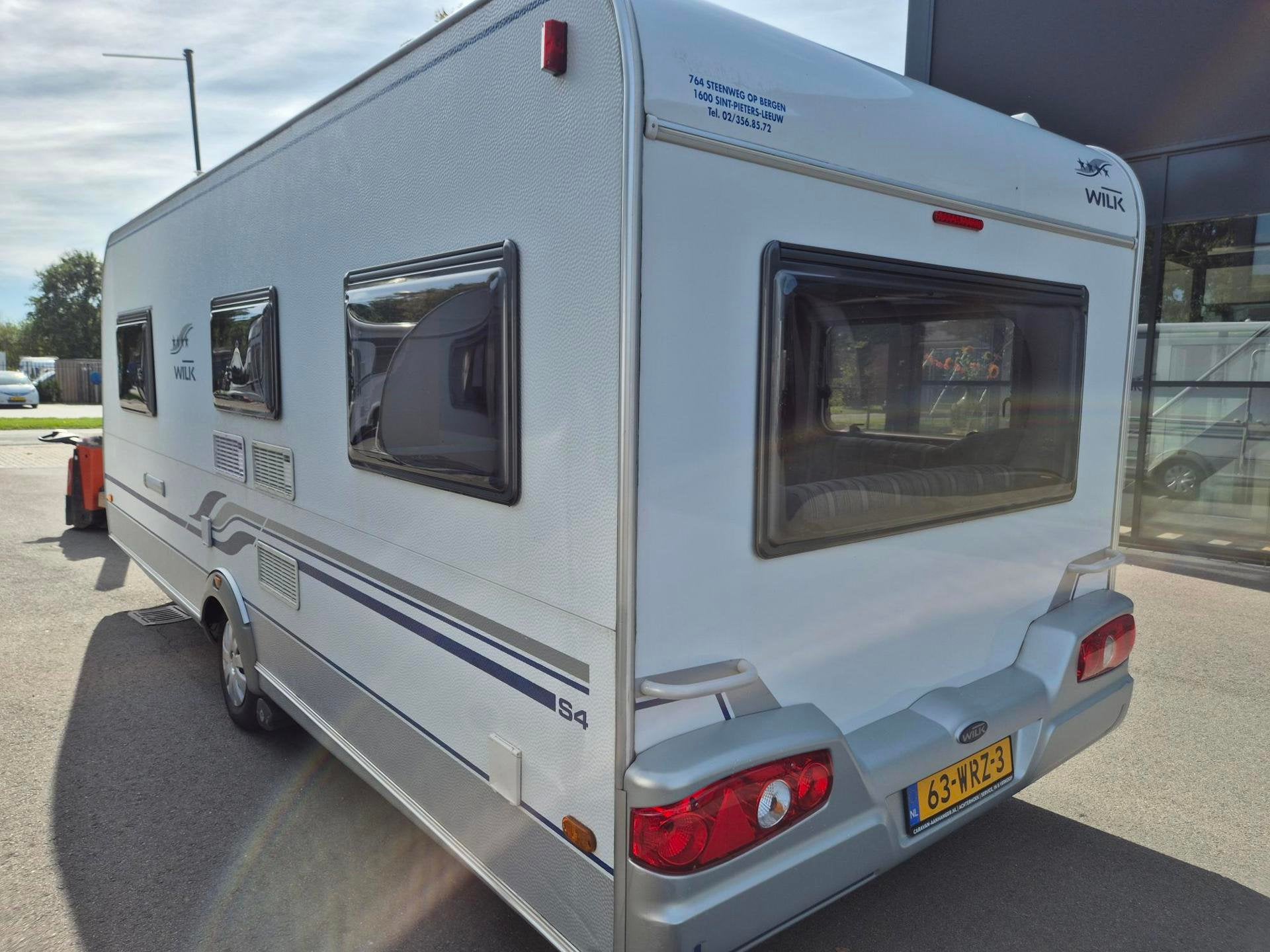 Wilk S4 530 EU Enkele bedden rondzit mover luifel TV 2e eig, Caravans en Kamperen, Rondzit, Bedrijf, 5 tot 6 meter, Wilk