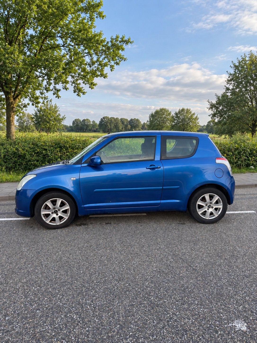 Suzuki Swift 1.3 3D 2007 Blauw, Stof, Swift, Origineel Nederlands, Handgeschakeld