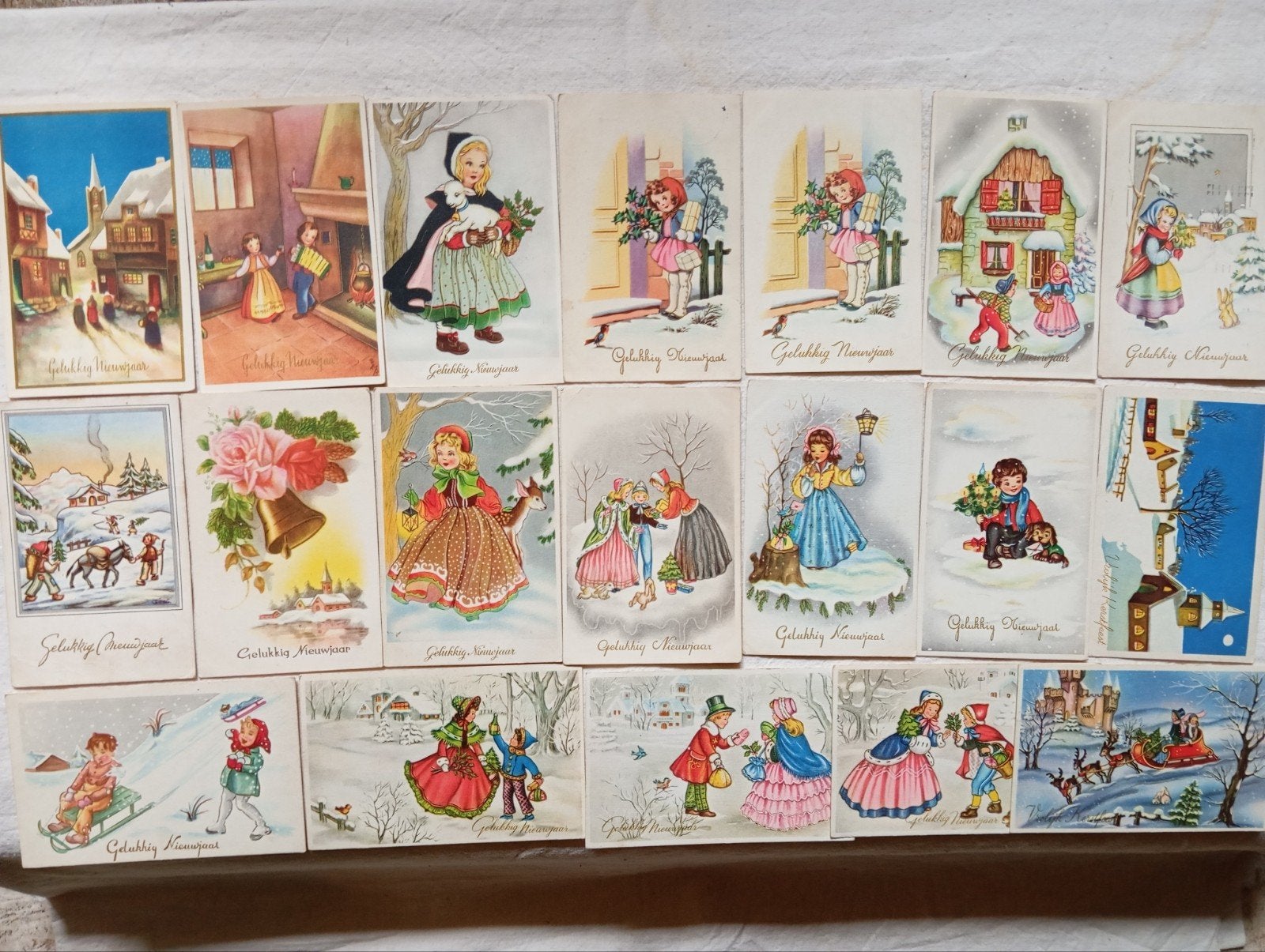 mooie set vintage nieuwjaarskaarten van hetzelfde merk, Ophalen of Verzenden