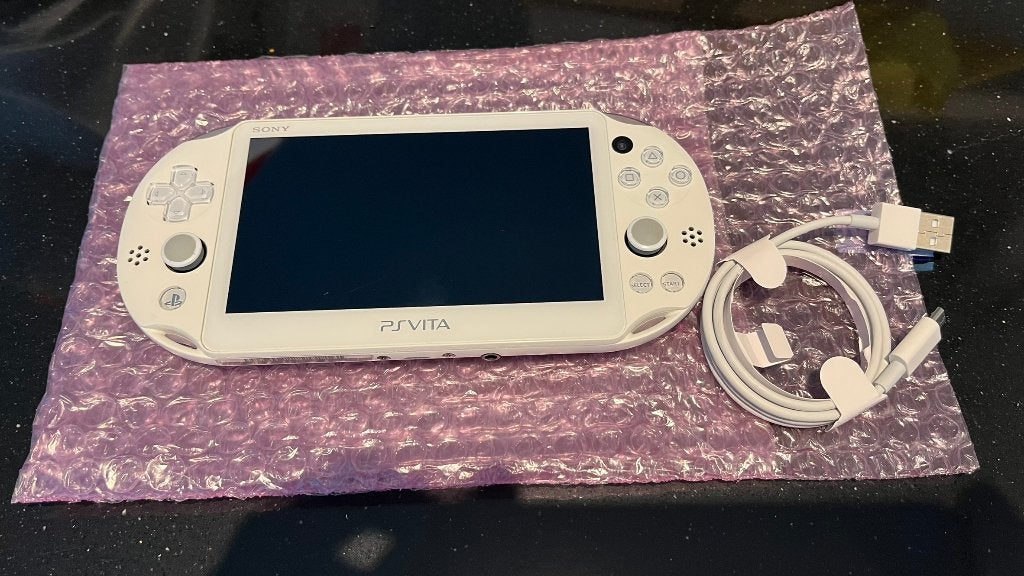 Playstation Vita Slim 2000 PSVita PS Vita Wit PCH-2000ZA12, Spelcomputers en Games, 1 speler, Racen en Vliegen, Ophalen of Verzenden