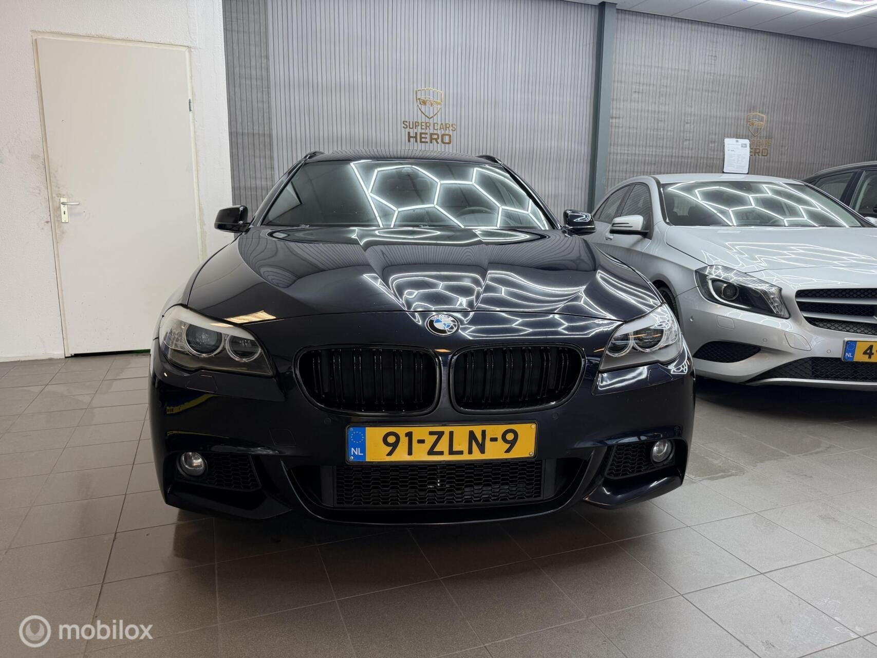 Foto 4 van BMW 5-serie Touring 520i High Executive