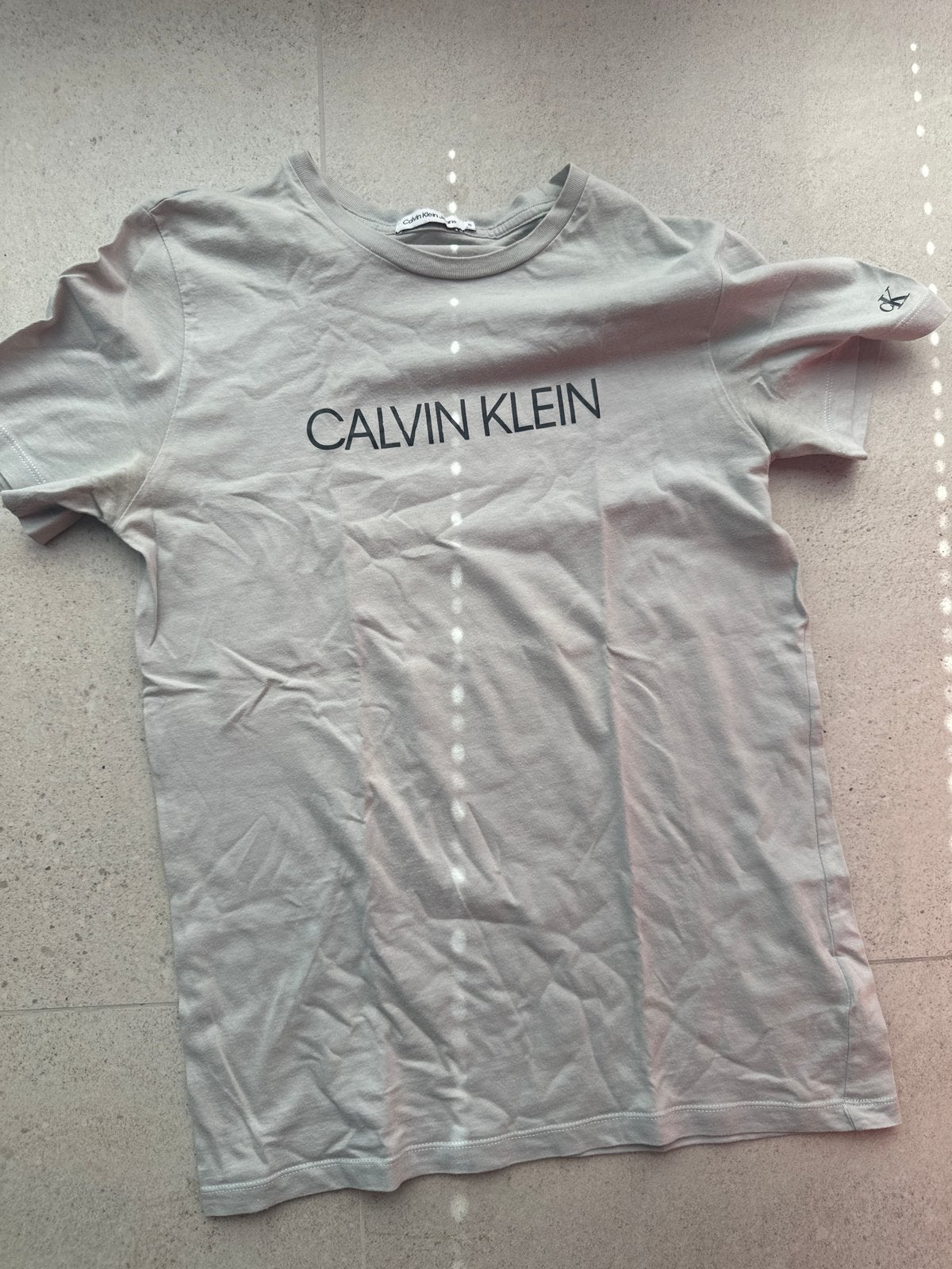 Calvin Klein T-shirt - Gedragen, Ophalen of Verzenden, Gedragen, Overige maten, Grijs