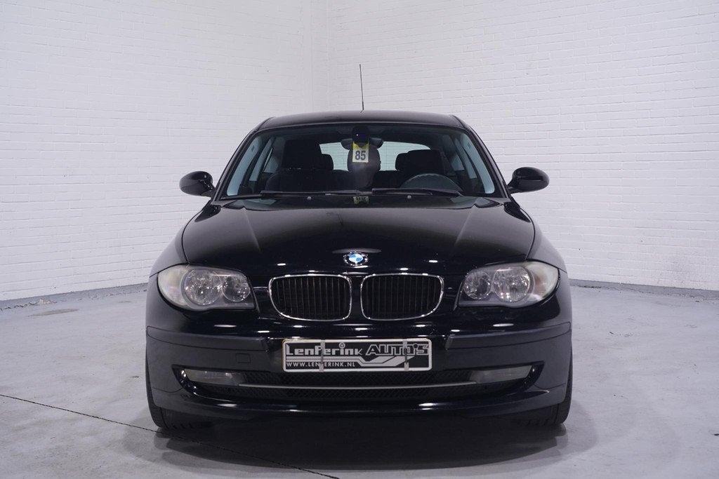 BMW 1-serie 116i Business Line airco sportstoelen stuurbedie, Auto's, 1-Serie, Euro 5, Zwart, 4 cilinders