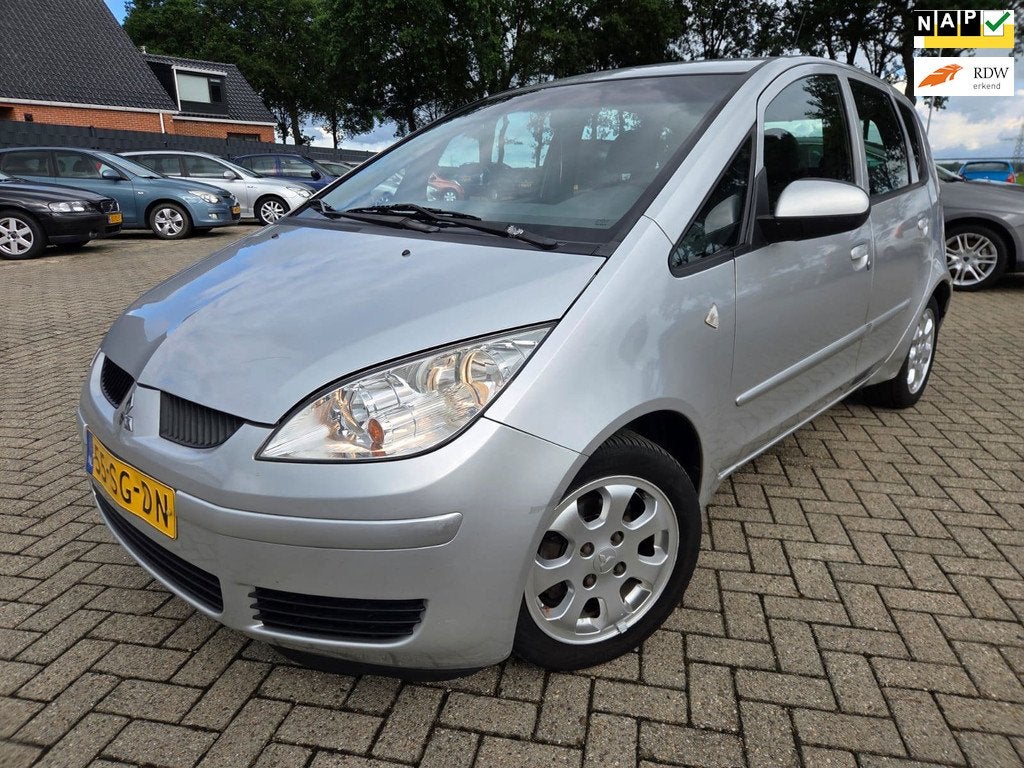 Mitsubishi Colt 1.3 Invite 5Drs 2005 Automaat/Airco/Elektris, Auto's, Voorwielaandrijving, Stof, Gebruikt, 31 €/maand